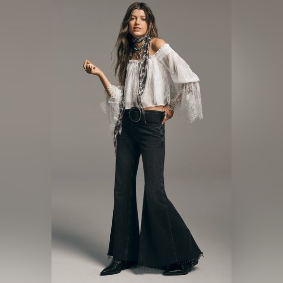 We The Free Pants - 🆕 Free People Black Flared Jeans with faint gold moon and stars print size 25
